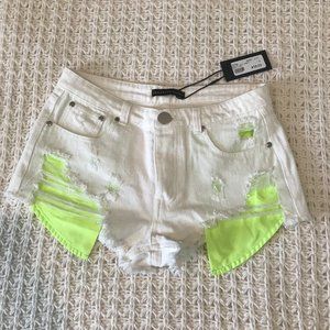 Brooklyn Karma white jean shorts with neon pockets